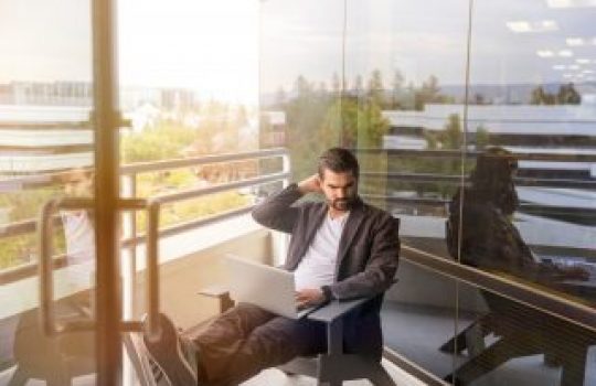 Man looking at laptop