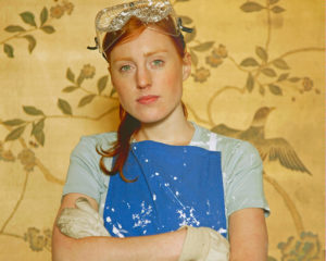 A woman making home improvements