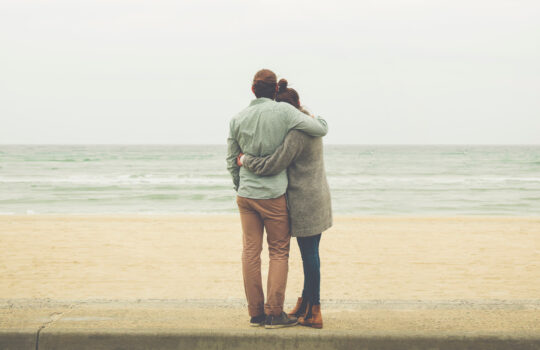 Couple stood on the beach