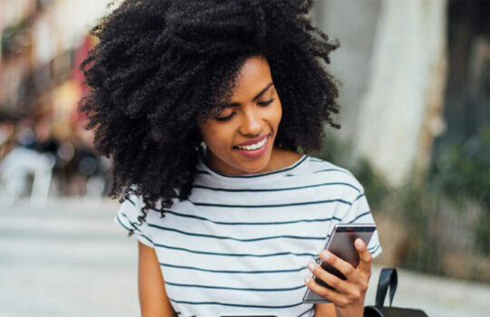 Woman in the street on phone